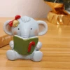 Miniature Cute Elephant Reading Book Decor– Cute Decor For Terrariums -Cute Farms Shop 22 d495c549 bc2f 40ac 893a bbad8108d7dd