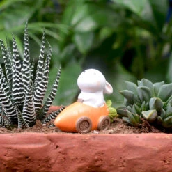 Miniature Rabbit In Carrot Car – Fun Resin Decor For Gardens & Gifts