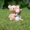 Miniature Girl With Teddy Bear – Cute Resin Decor For Gifts & Gardens -Cute Farms Shop Little Girl Holding Bear 1