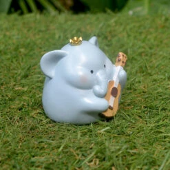 Miniature Elephant Playing Guitar – Cute Resin Decor For Gifts & Gardens 8 Miniature Elephant Playing Guitar – Cute Resin Decor For Gifts & Gardens -Cute Farms Shop Plump Elephant Guitar 2