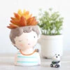 Winking Boy With Snail Resin Succulent Pot 11 Winking Boy With Snail Resin Succulent Pot -Cute Farms Shop winking boy with snail 1